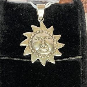 Sterling silver Sun Face Pendant. NWT